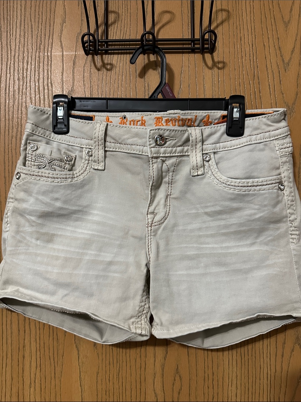 Rock Revival Women's Light Beige Denim Shorts with Embellished Pocket